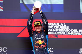 Verstappen holds off charging Norris to win at Imola