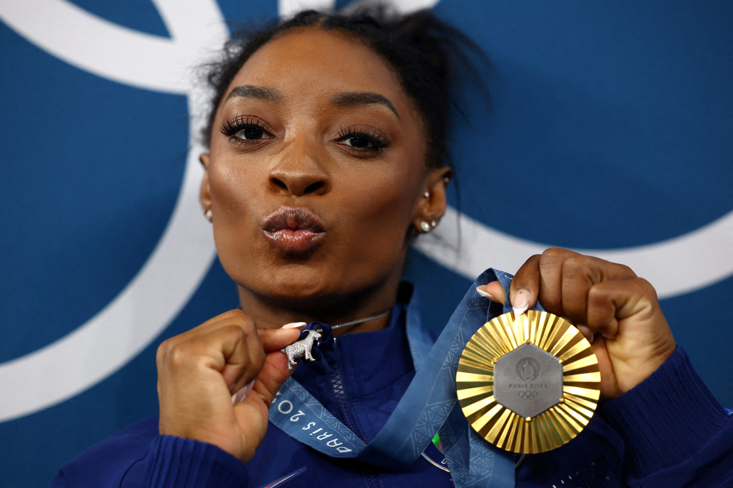 Simone Biles stands head and shoulders above rivals after clinching all-around gold