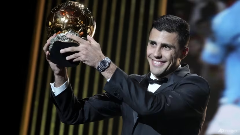 Spain midfielder Rodri wins men’s Ballon d’Or as Real Madrid boycott