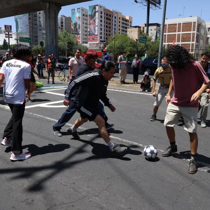 Mexican protesters turn highway into football pitch to slam World Cup ‘dispossession’