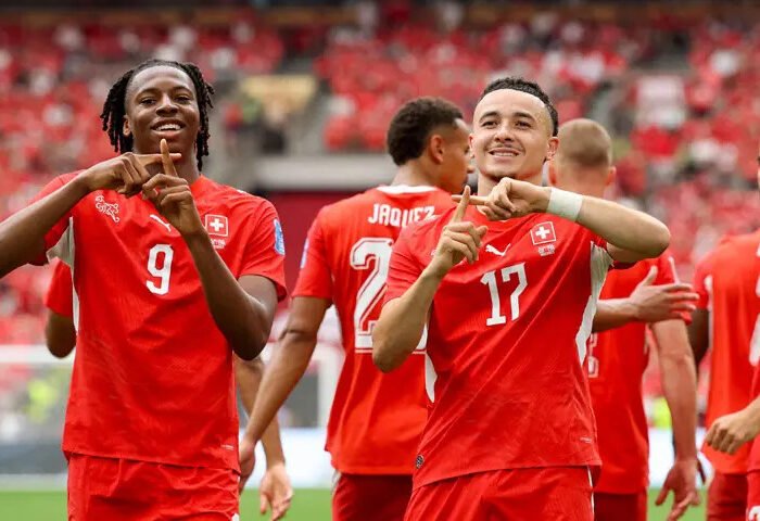 Switzerland down Canada to top Group B