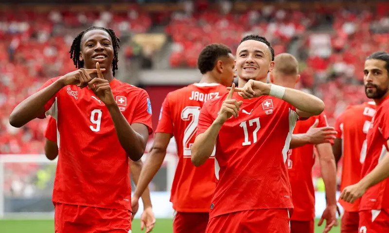 Switzerland down Canada to top Group B
